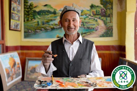(社会)(2)农民画家阿卜力克木追梦六十载
