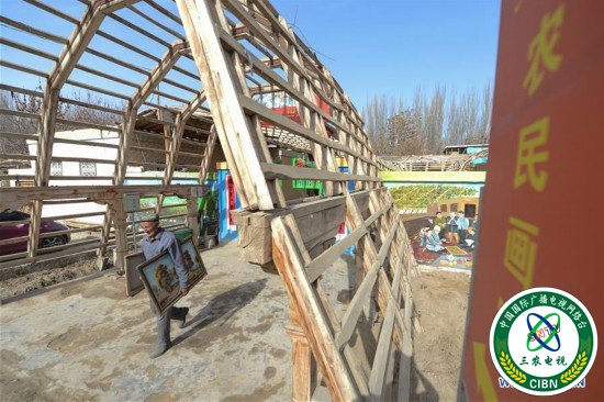 (社会)(6)农民画家阿卜力克木追梦六十载