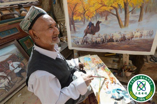 (社会)(1)农民画家阿卜力克木追梦六十载